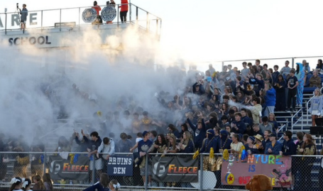 Student section cheering for 1st down