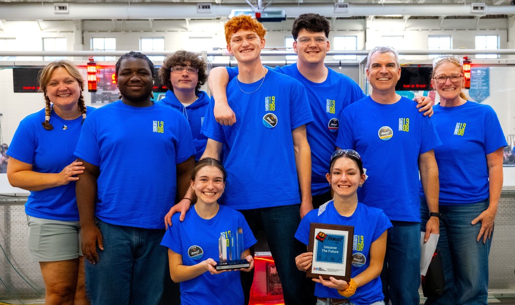 The ShoreBots Robotics Team 1908  posing with awards