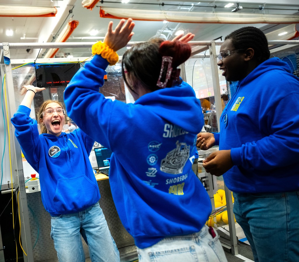 students celebrating at competition