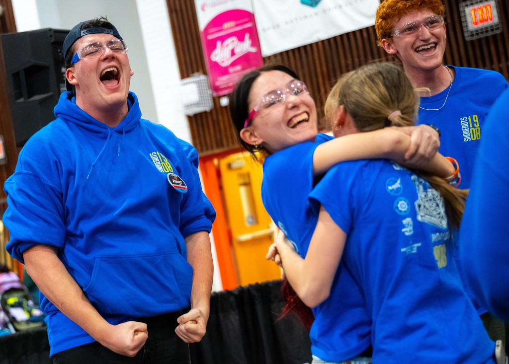 students celebrating at competition
