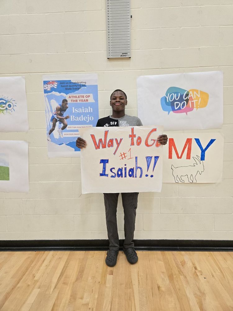 student holding sign