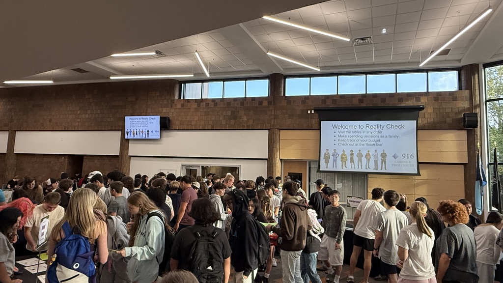 Students gathered in a lobby for an event.
