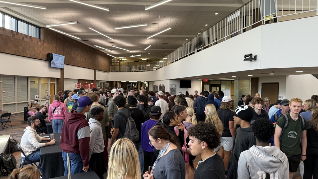 Students gathered in the lobby area for an event.