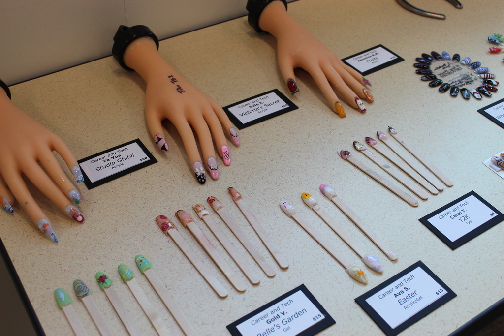 A close up image of various nail art from students.