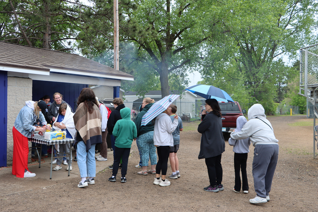 Staff and students in line to get lunch.