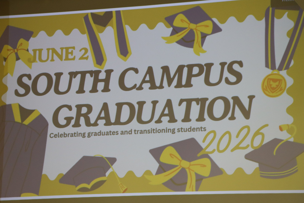 Presentation screen with graduation gowns and text that says, "South Campus Graduation celebrating graduates and transitioning students 2026." 