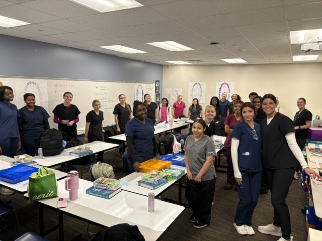 Dental Career students on the first day of wearing scrubs. 