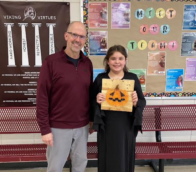 Sadie Janssen and jack-o-lantern