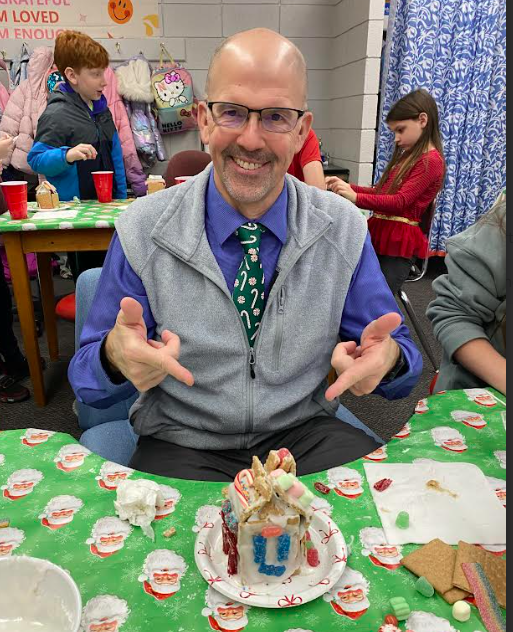 Dr. Streeter with gingerbread creation