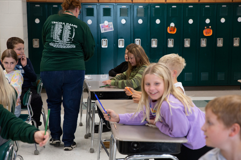 Kids getting pencils