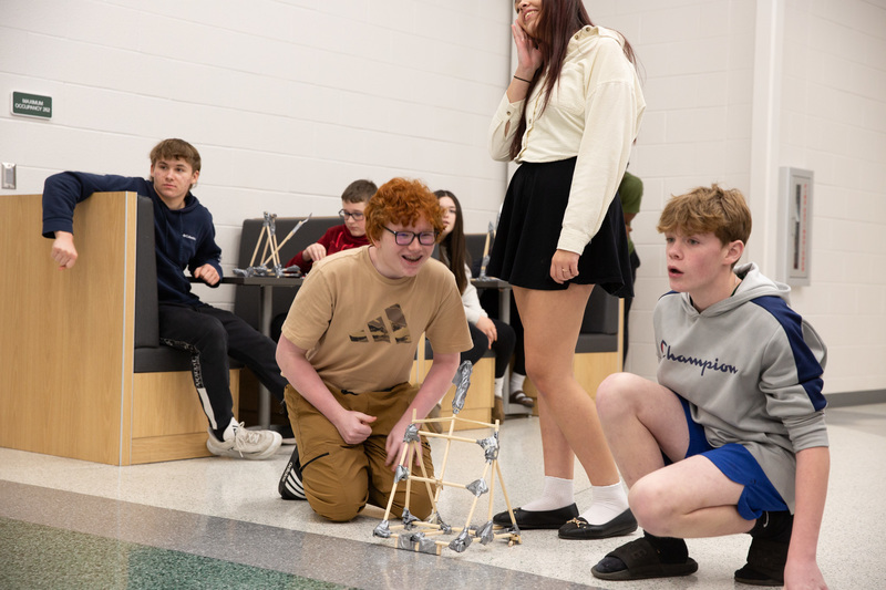 kids using a catapult