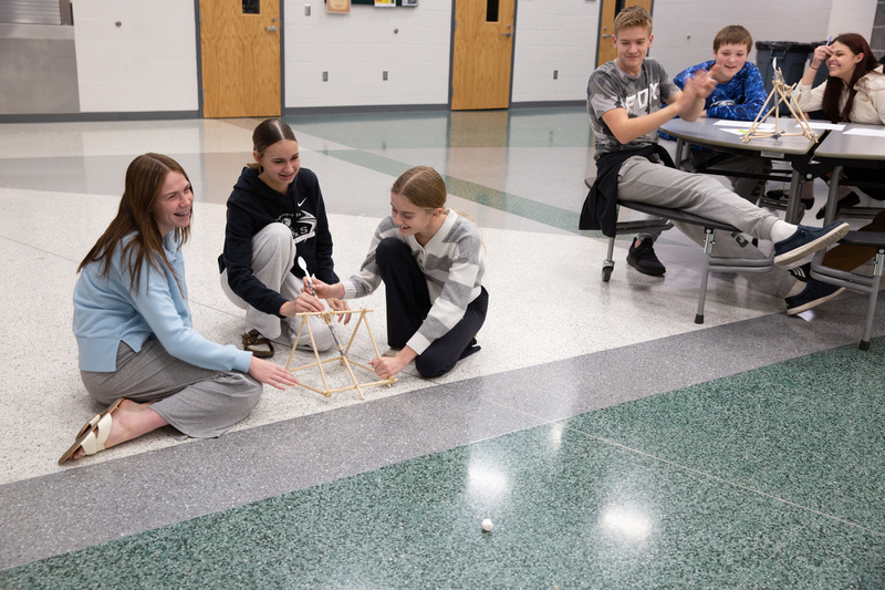 kids using a catapult