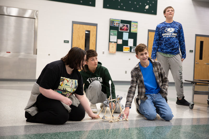 kids using a catapult