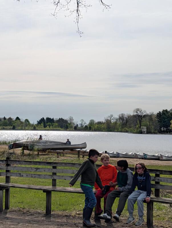 kids sitting on a bench