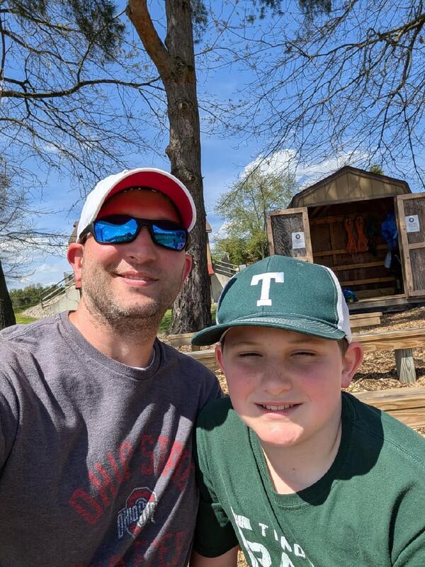 father and son at camp