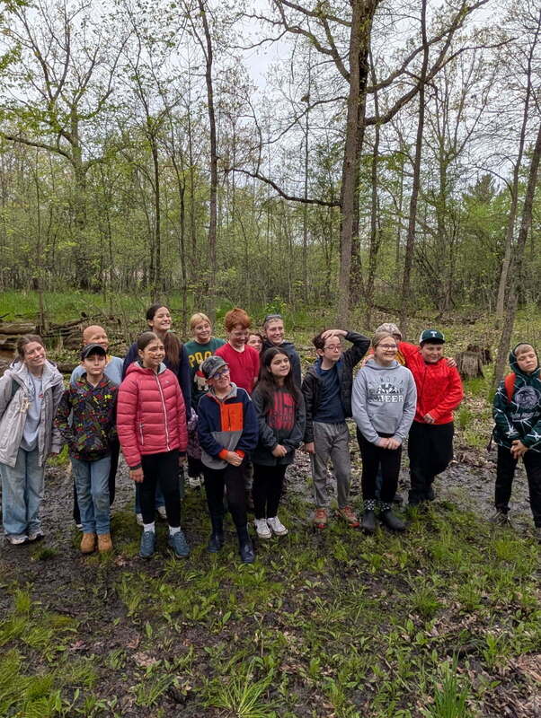 kids standing on trail