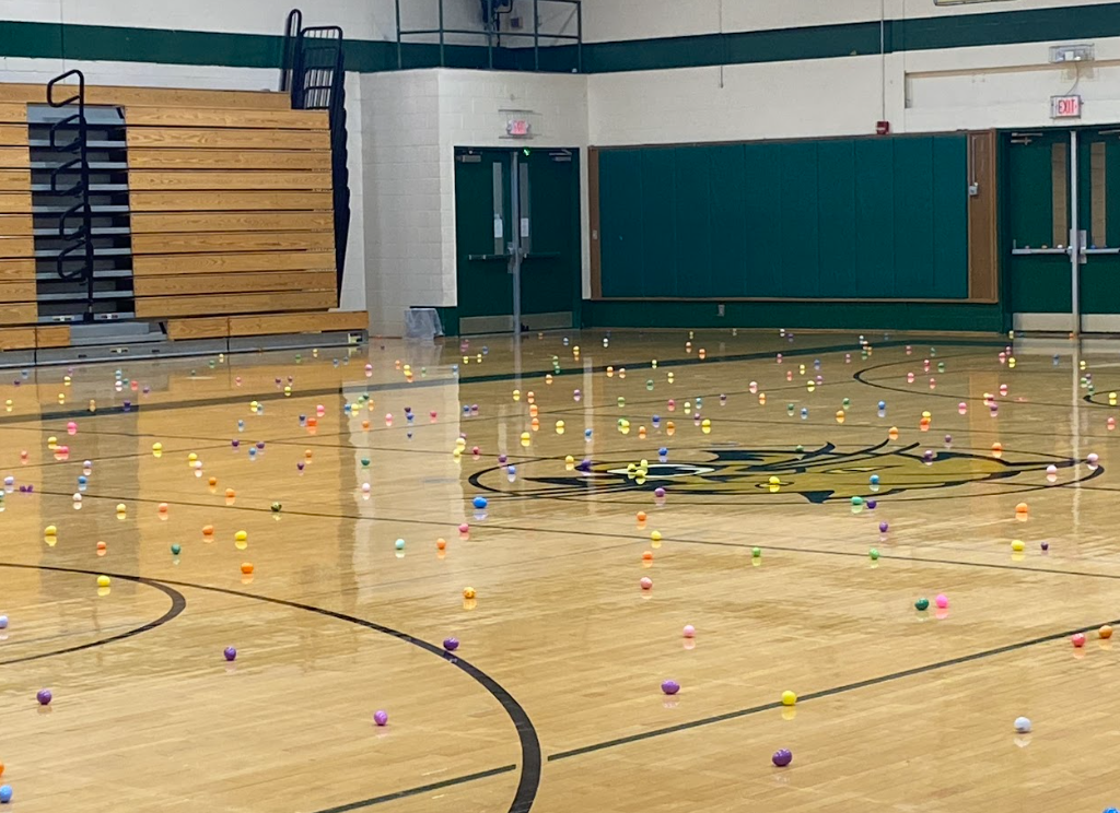 Easter eggs littered across the gym floor