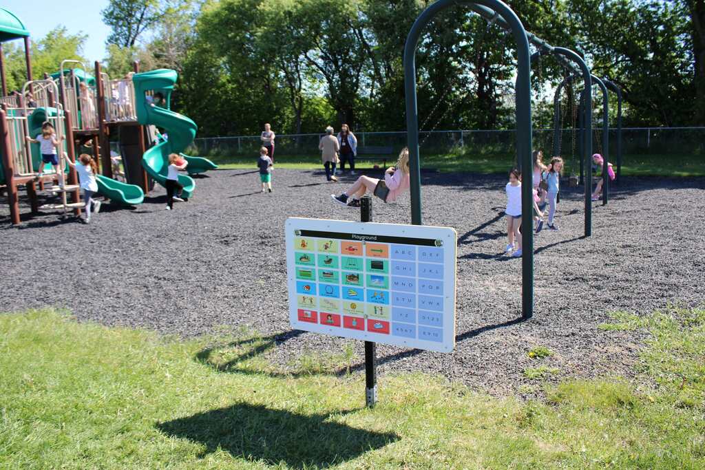 Students use outdoor communication board
