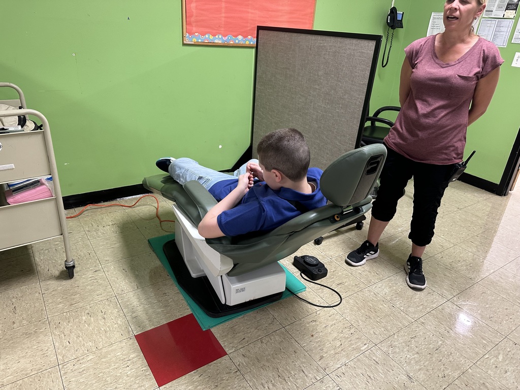 trying out the chair