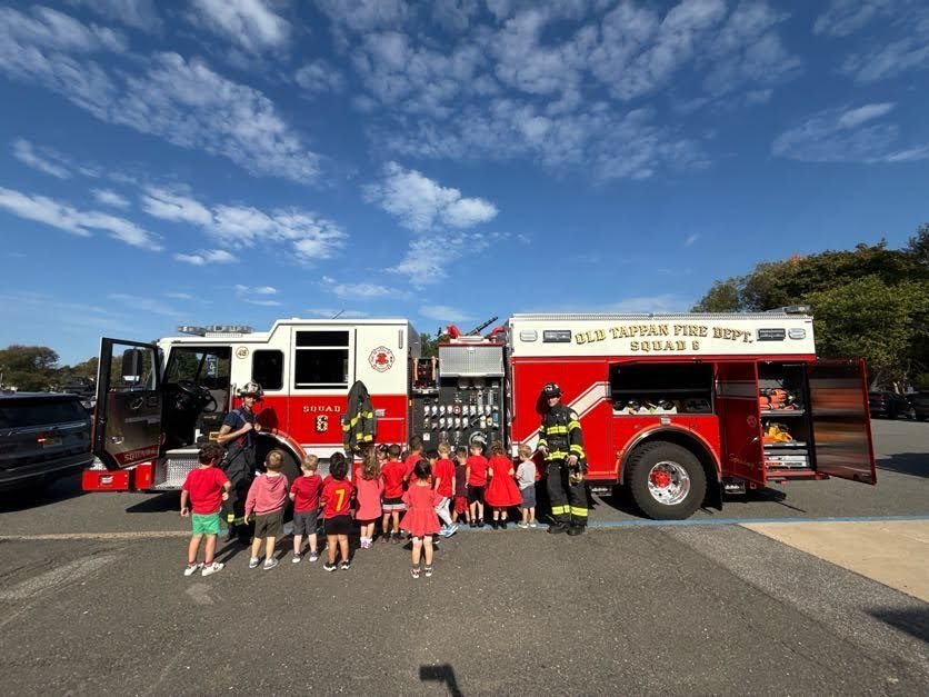 Tots with a fire truck