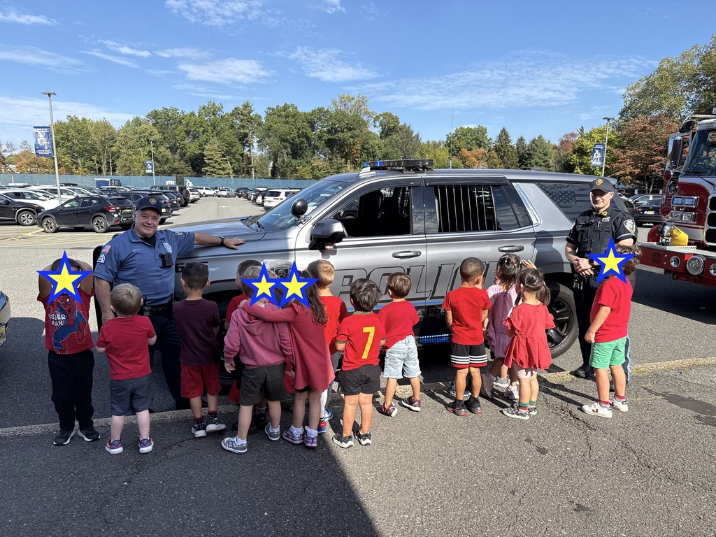 Tots with the police car