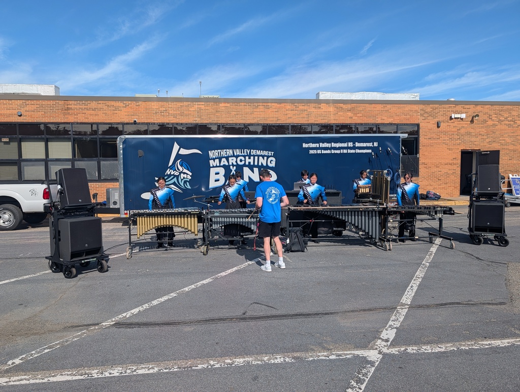 Warming up in front of the band trailer. 