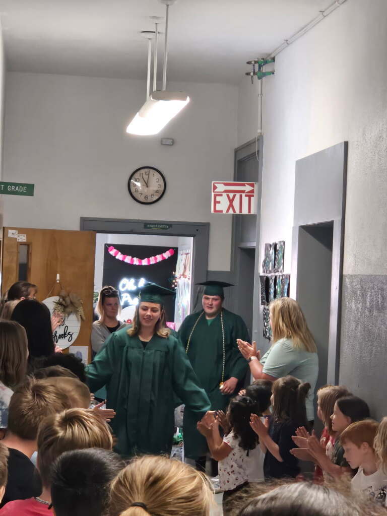 2026 Senior walk the halls of the grade school one last time.
