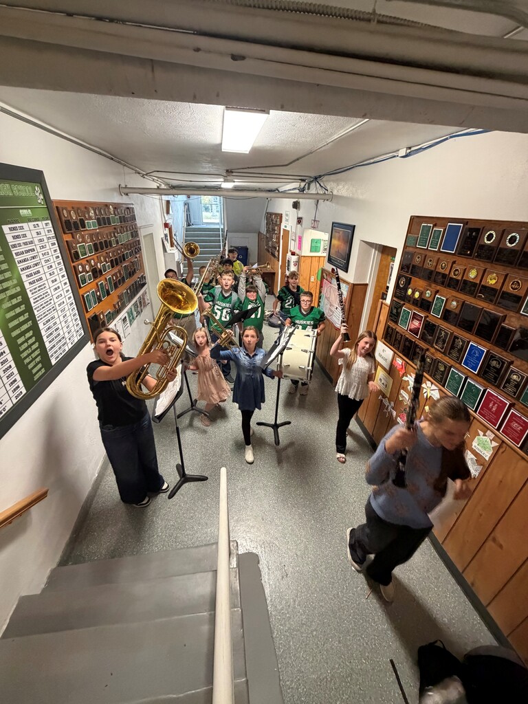 Pep band heading into the gym to start the pep rally before our last home game