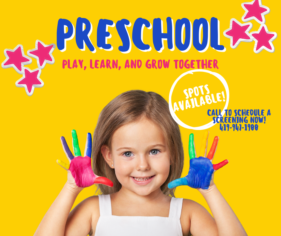 photo of young girl with finger paint on hands advertising preschool