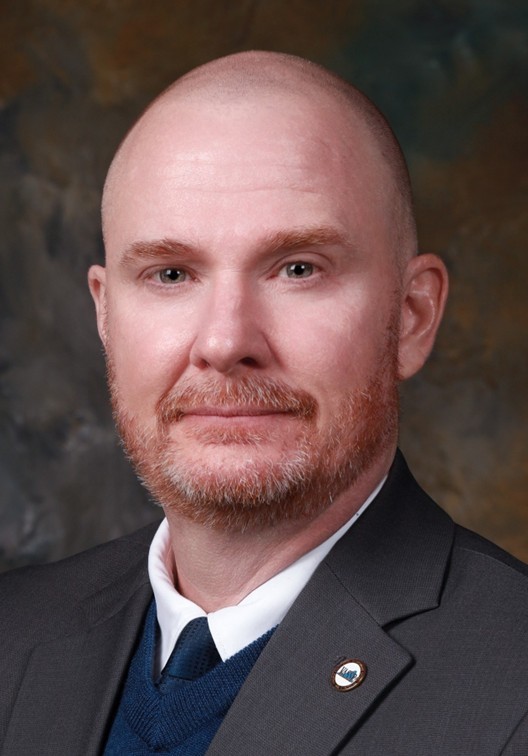 Dr. Travis Burns