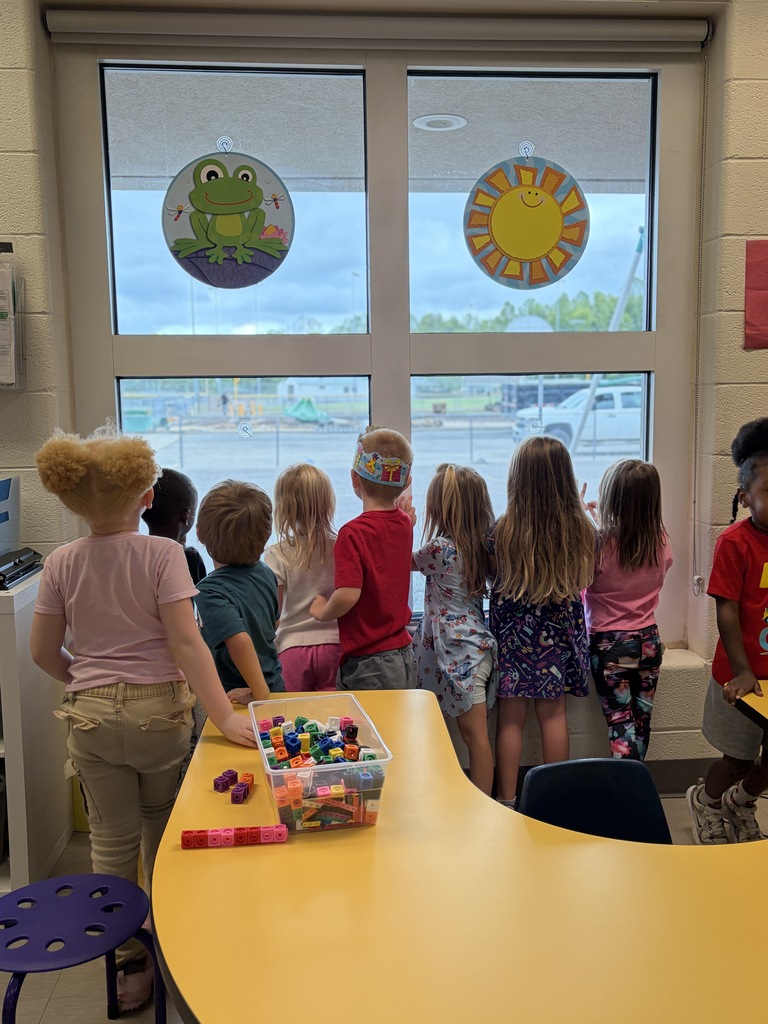 Students watching the tear down of the playground.