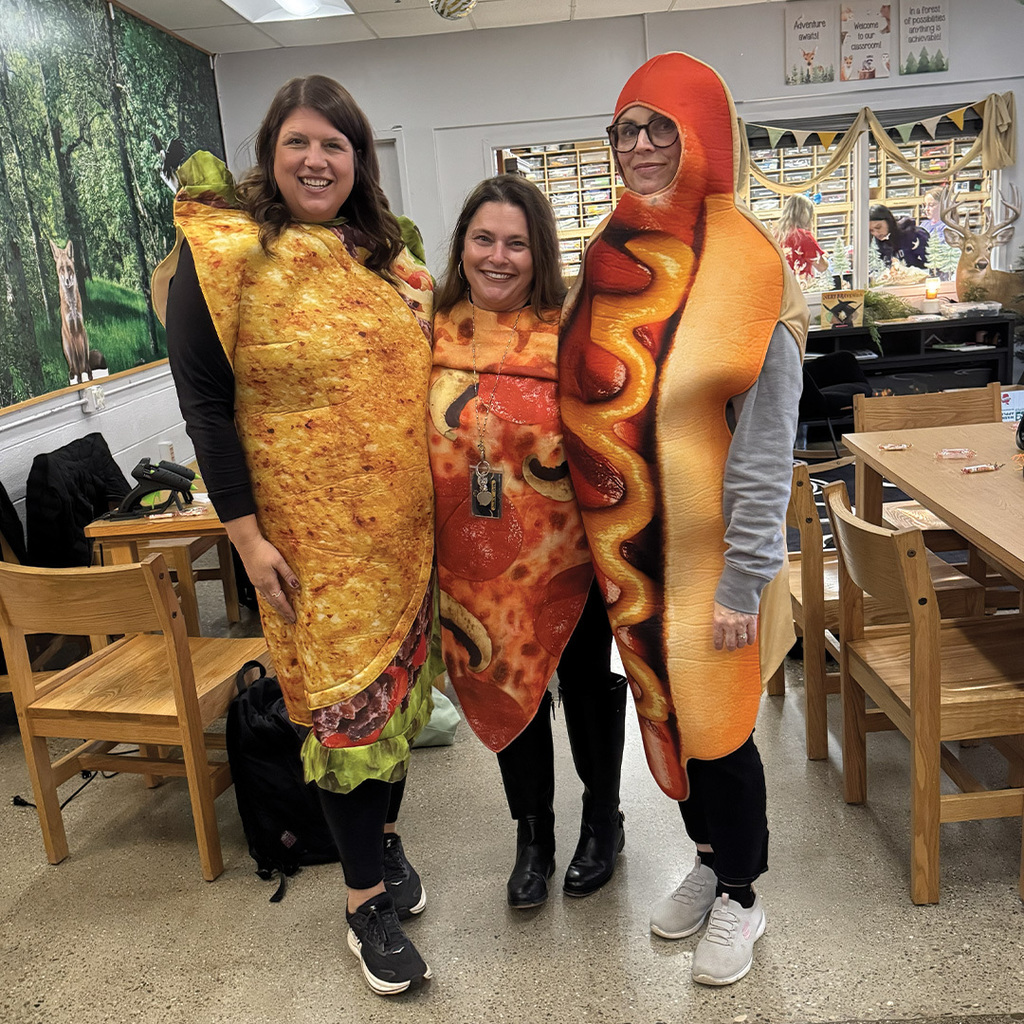 North Ed Career Tech instructors dressed as a taco, pizza, and hotdog.