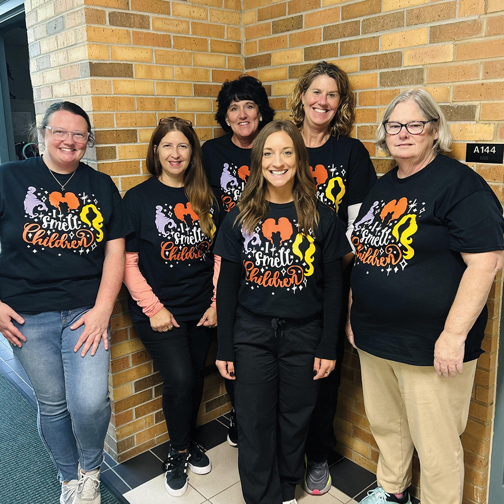 North Ed New Horizons at Traverse City Central high school wearing match shirts with Hocus Pocus quote that reads "I smell children"