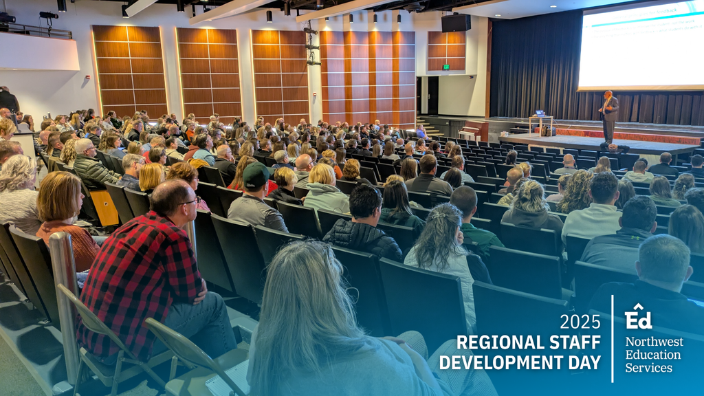 Image of Dylan Wiliam presenting on Formative Assessment in the Traverse City Central High auditorium for Regional Staff Development Day.