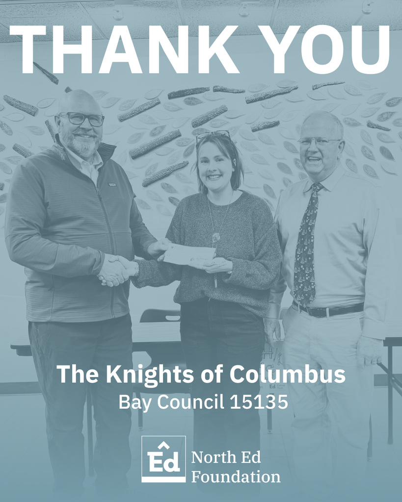 Thank-you graphic featuring three adults standing indoors. The person in the center holds a check while shaking hands with the person on the left; the third person stands to the right, smiling. Large text at the top reads “THANK YOU.” Text at the bottom reads “The Knights of Columbus Bay Council 15135,” alongside the North Ed Foundation logo. The image has a blue-tinted overlay and a decorative wall pattern in the background.