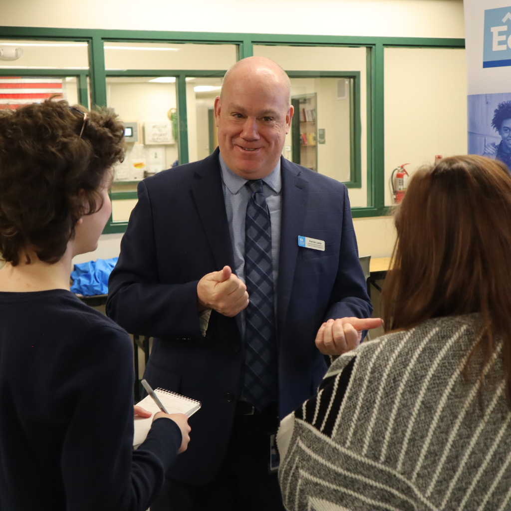 Pat Lamb being interviewed by two Writers Studio students.