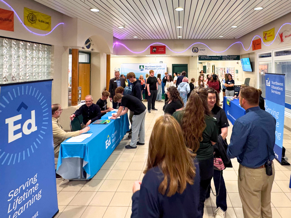 The crowd of North Ed Career Tech students and instructors, and representatives from Northwestern Michigan College at the articulation agreement signing event.