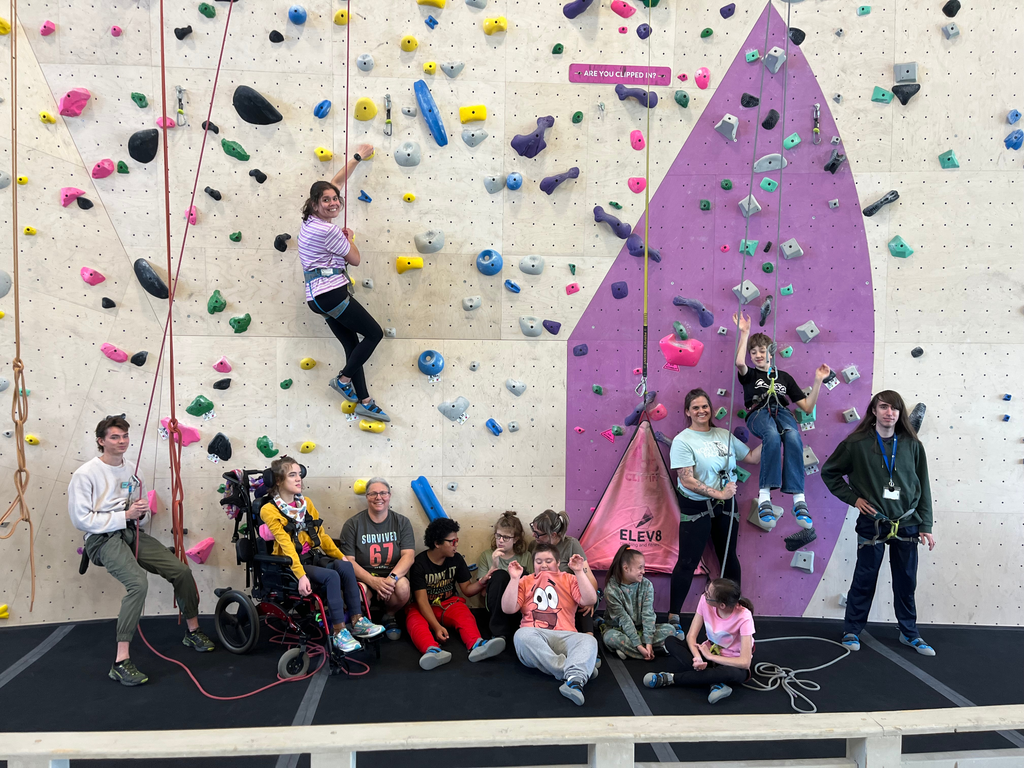 Group photo of North Ed New Horizons students rock climbing at Ele8. 