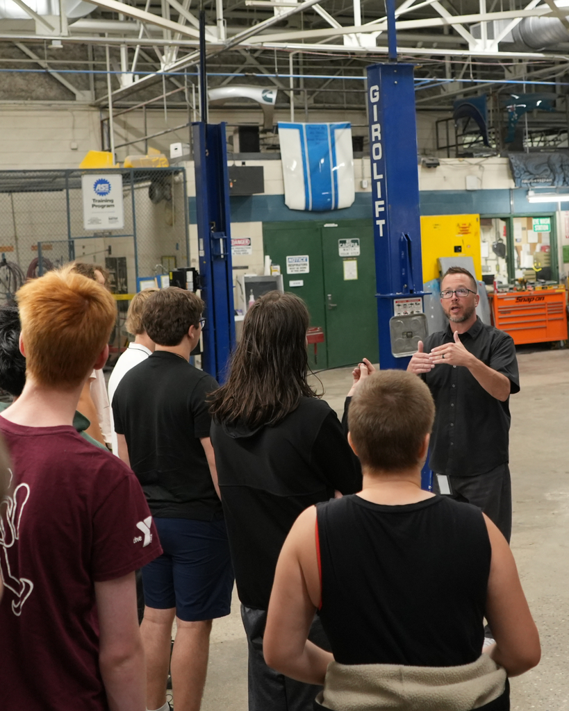 Instructor giving a tour to North Ed Career Tech students. 