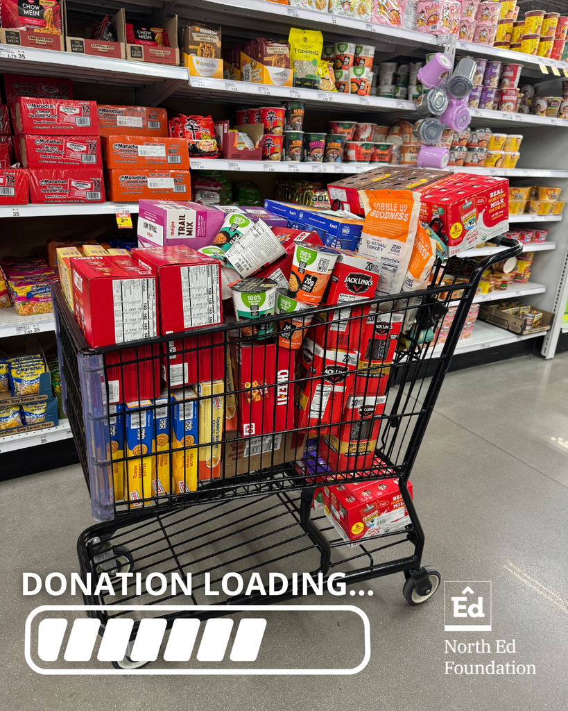 Filled grocery cart with graphic overlay that reads "donation loading..." with the North Ed Foundation logo.