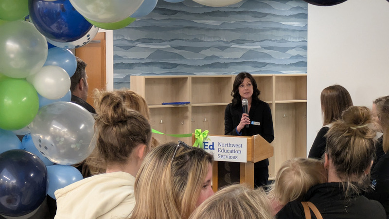 Dr. Tara Mager, superintendent of Northwest Education Services, speaks from the podium during a ribbon-cutting ceremony for the Joseph C. Fisher Early Childhood & Family Center.