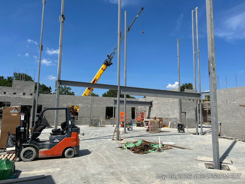 Block walls of classroom wing building upward