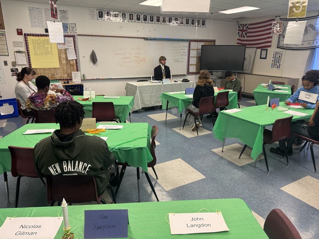 Students sitting at tables