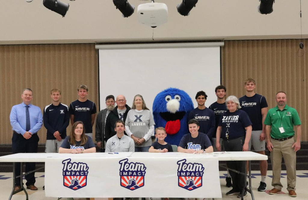  3rd grader Abram signed a contract to join Xavier University's men's soccer team in front of his entire grade through Team Impact.