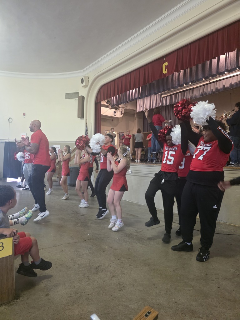 cheerleaders and football players