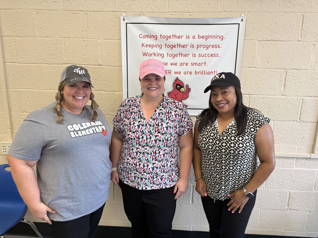 teacher, principal, assistant principal wearing hats