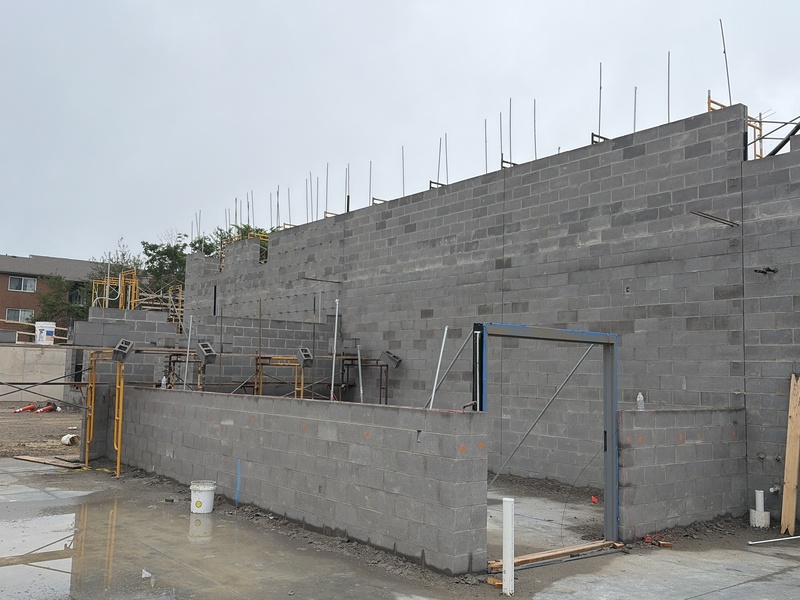 Block walls of classroom wing building upward