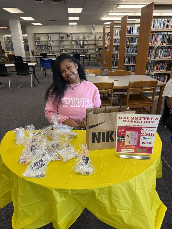 one student sitting a table