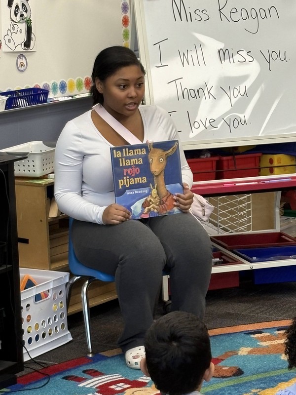 A girl holding a book