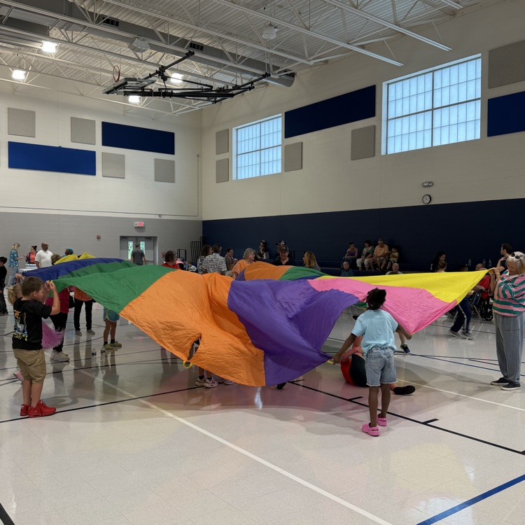 Playing with the parachute 